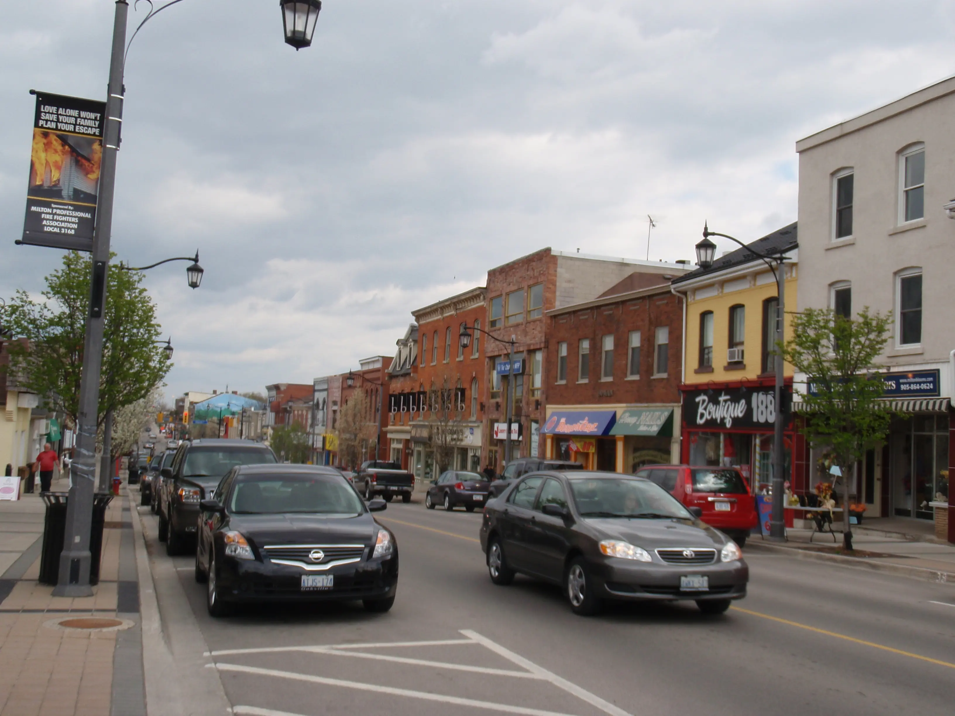 A Milton, Ontario residential street showing a mix of housing styles